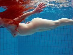 UhFuck presents: Redhead simonna showing her body underwater