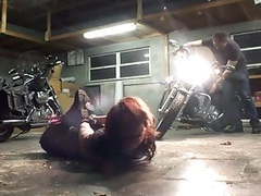 UhFuck presents: Biker girl hogtied in the garage