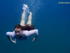 UhFuck presents: Chick gets naked swimming in the ocean