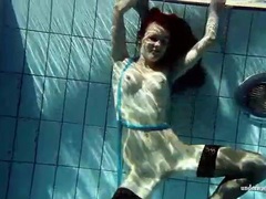 UhFuck presents: In black stockings pretty girl goes for a swim