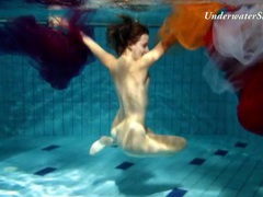 UhFuck presents: Artful naked underwater show with a hairy pussy girl