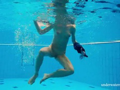 UhFuck presents: Teen strips off her dress as she goes for a swim
