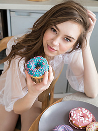 UhFuck presents: If you are a fan of skinny girls, check out how this cute little doll poses and teases totally naked in the kitchen.