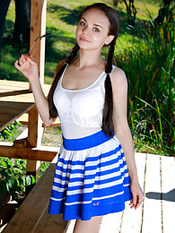 UhFuck presents: Fresh-Faced russian beauty Mia Grandy gets totally naked on a picnic table in a garden